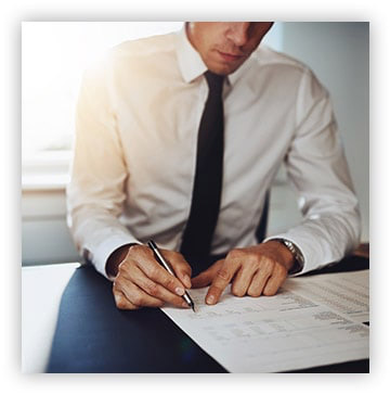 man reviewing business documents